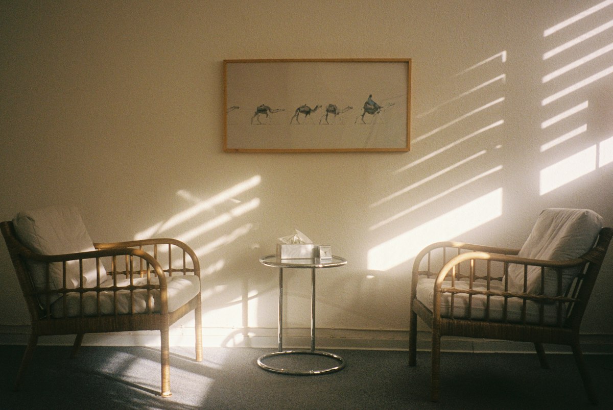 Two chairs in stripes of sunlight